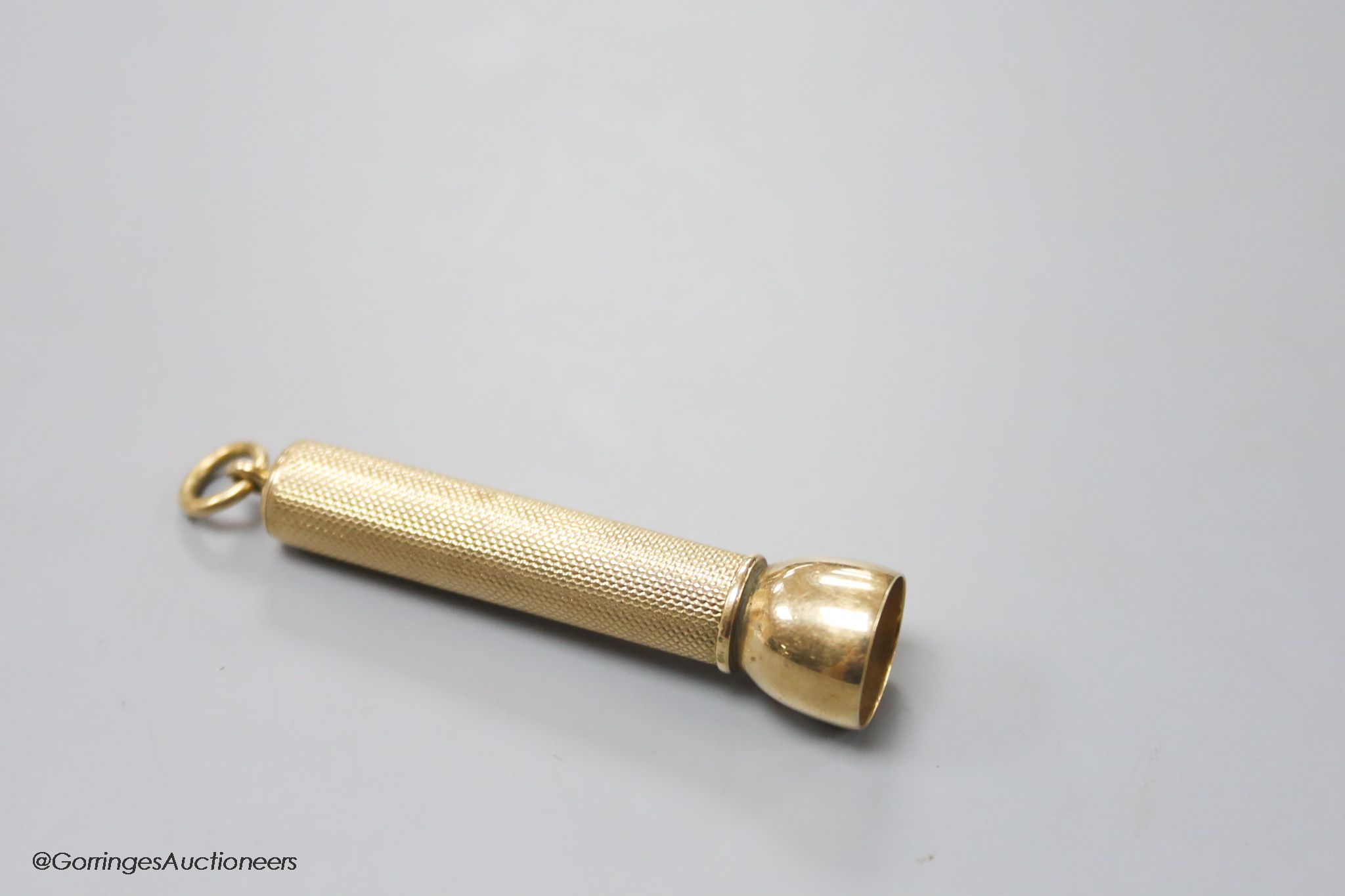 A George V 9ct gold cased cigar piercer by Sampson Mordan & Co, 61mm, gross 14.7 grams.